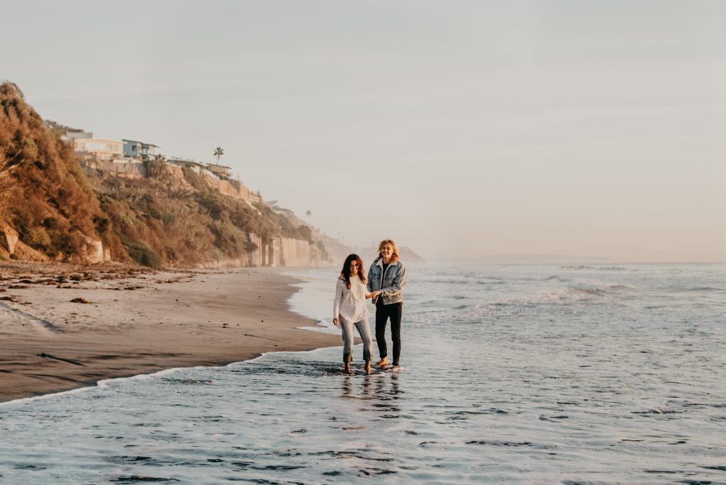 couple at beach in encinitas