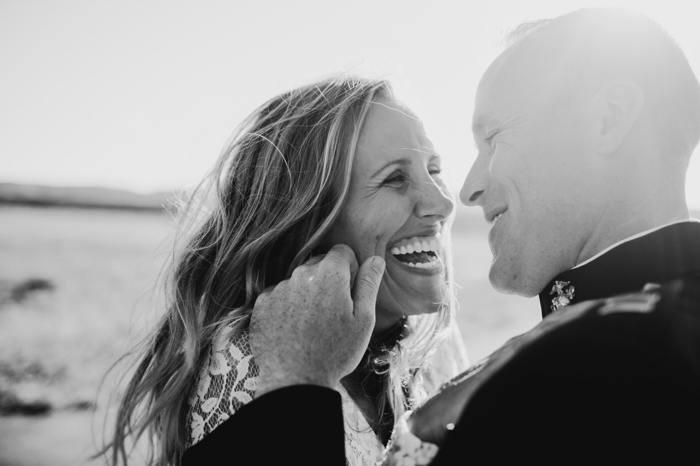 couple laughing black and white photo 