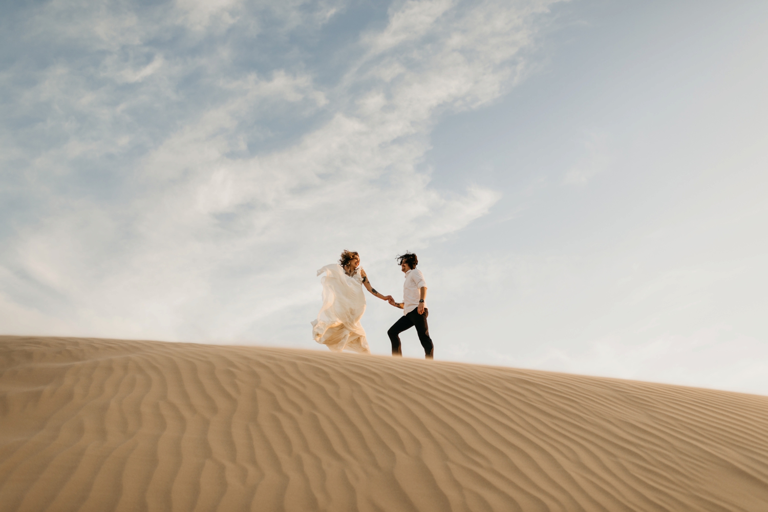 couple at glamis sand dunes