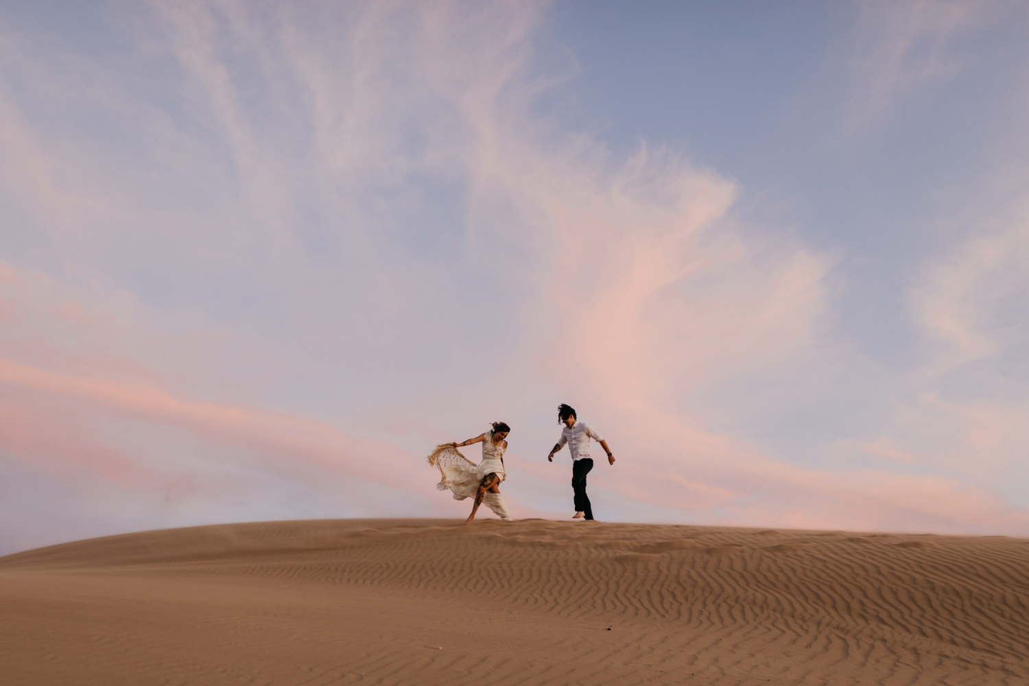 bride and groom in Morocco desert 