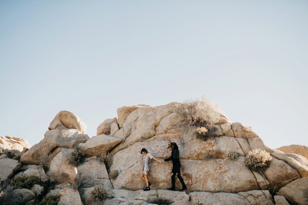 couple on rocks in Joshua Tree