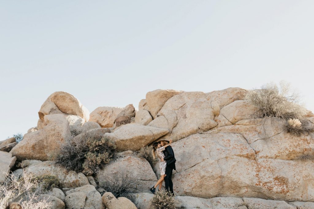 engagement shoot Joshua Tree on rocks